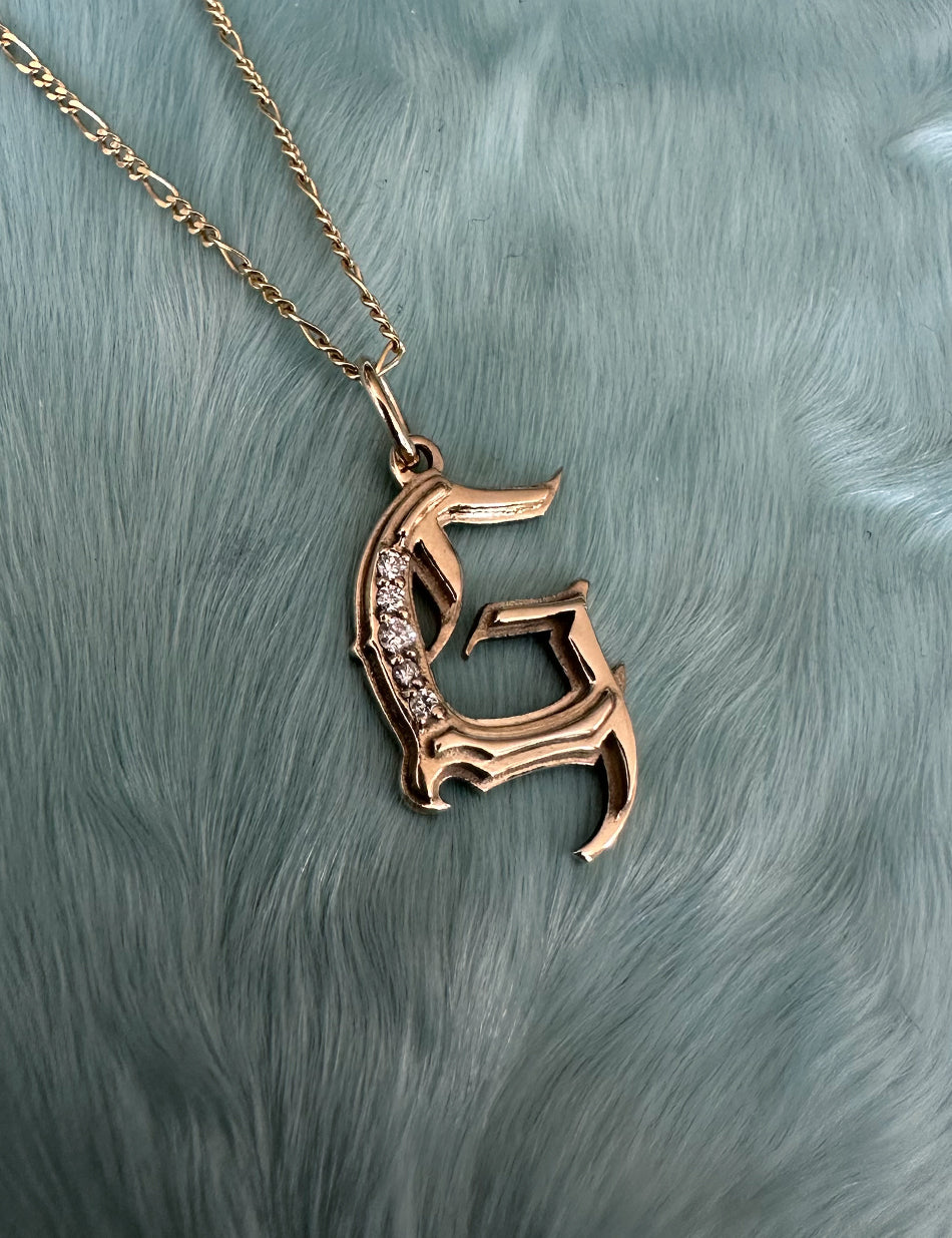 Gold Gothic Initial jewelry charm pendant with monogram "G" with diamonds by honey drip.