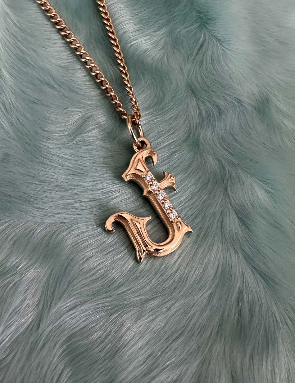 Gothic Initial jewelry charm pendant with monogram "J" in 14k gold with diamonds by honey drip.