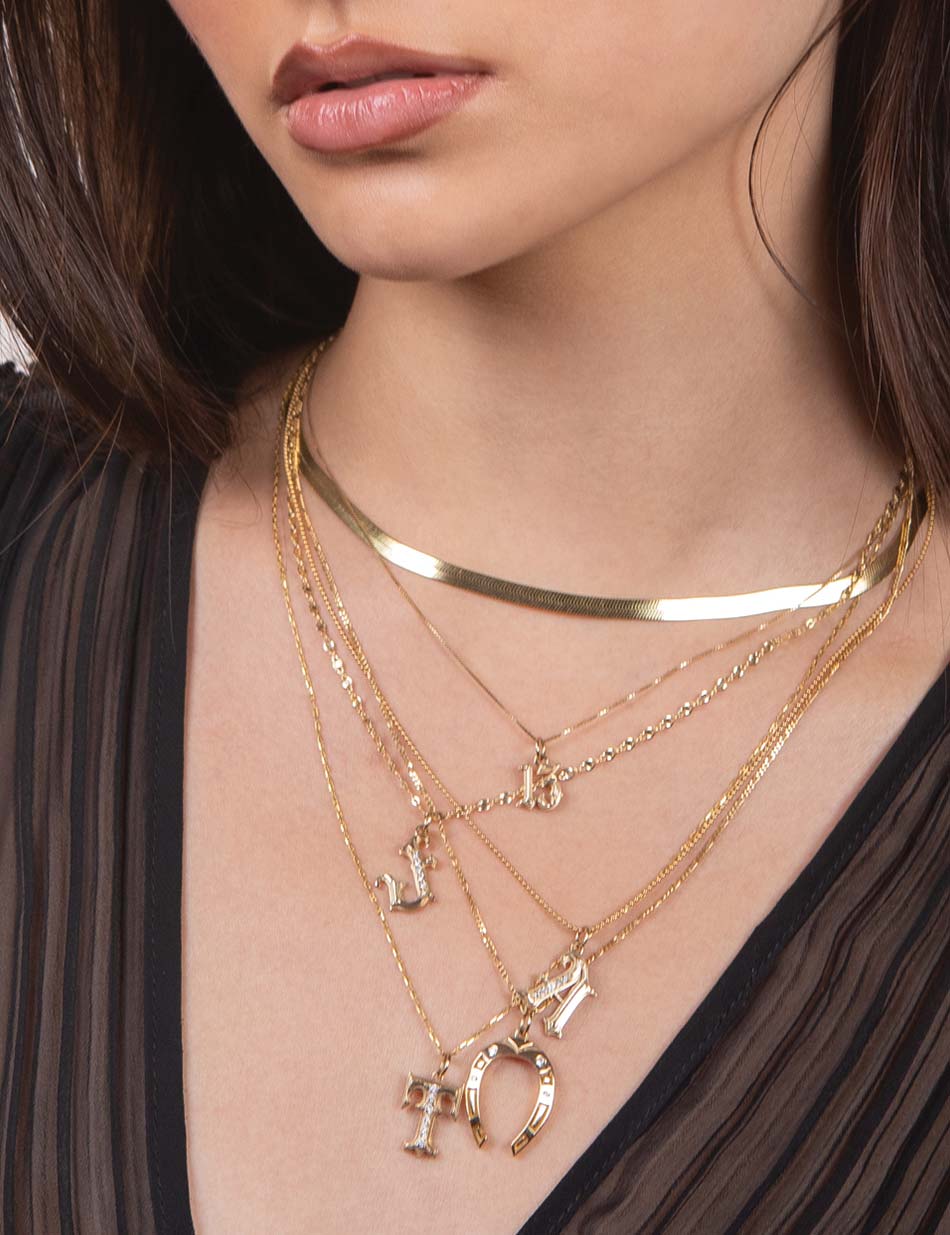 Gothic initial monogram jewelry charm pendants in 14k gold with diamonds by Honey Drip.