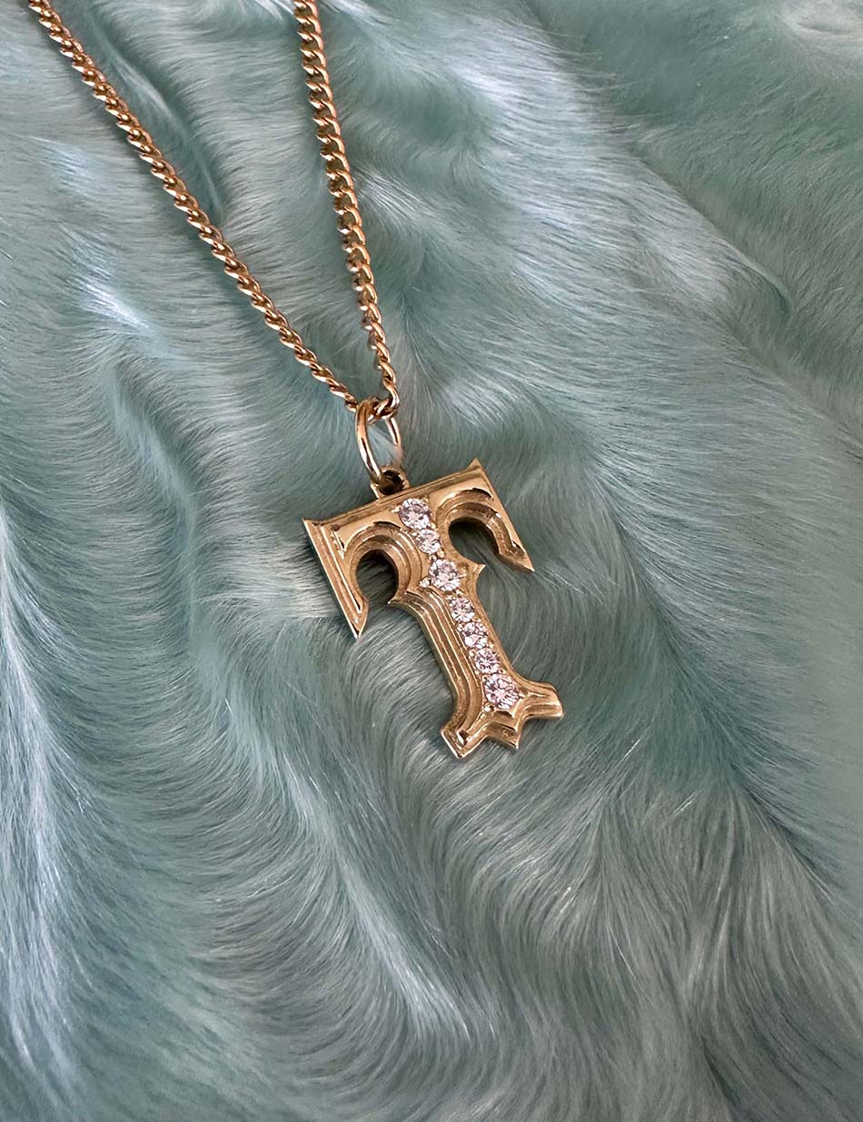 Gold Gothic Initial jewelry charm pendant with monogram "T" with diamonds by honey drip.
