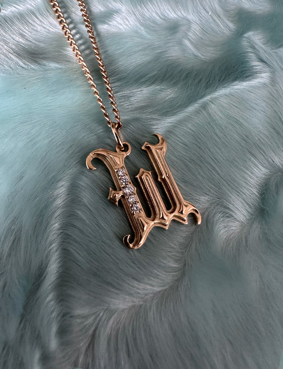 Gold Gothic Initial jewelry charm pendant with monogram "W" with diamonds by honey drip.