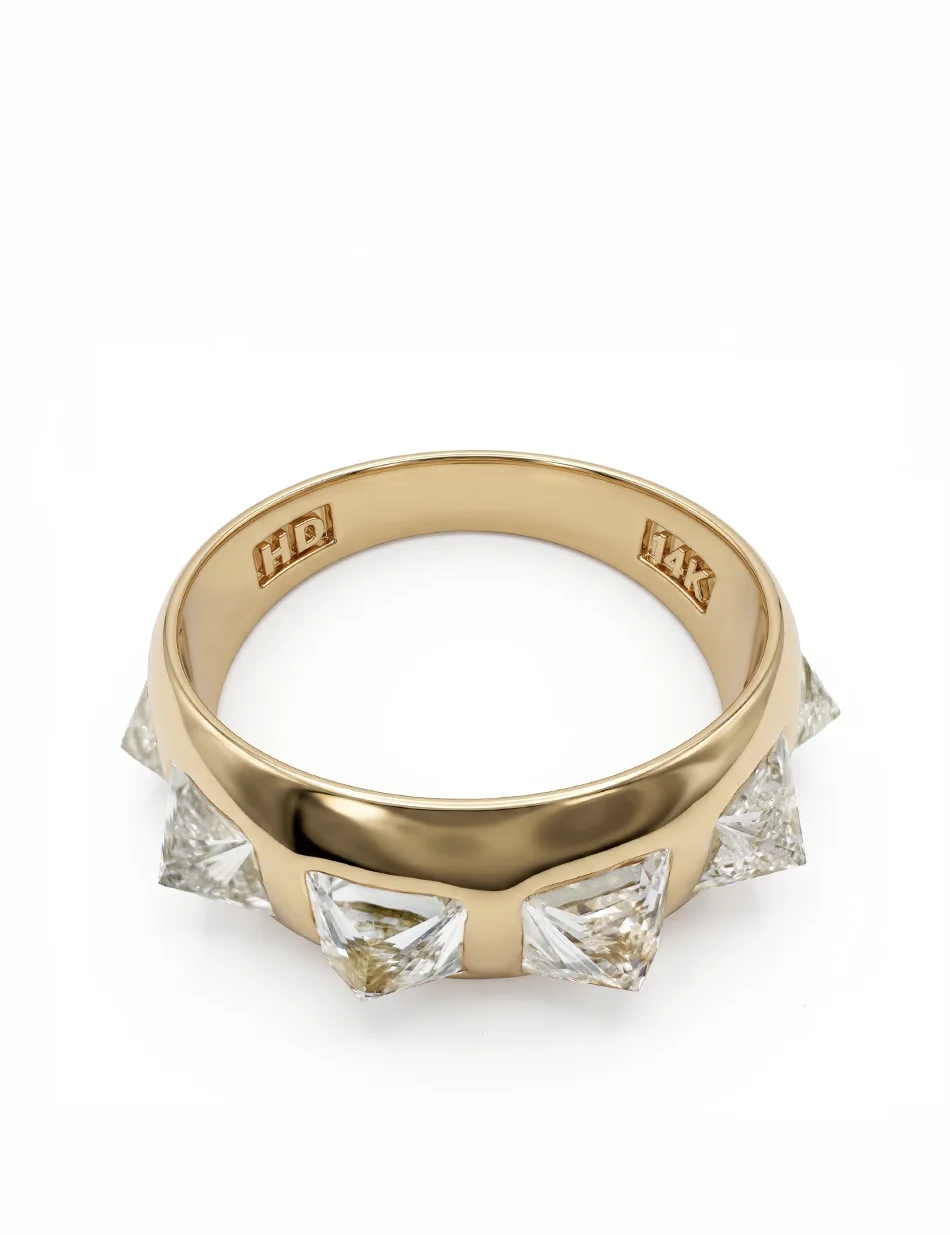 Side view of a gold diamond spike ring to display the attention grabbing height of the diamond spikes. An elevated fine jewelry ring for alternative style engagement and bridal.