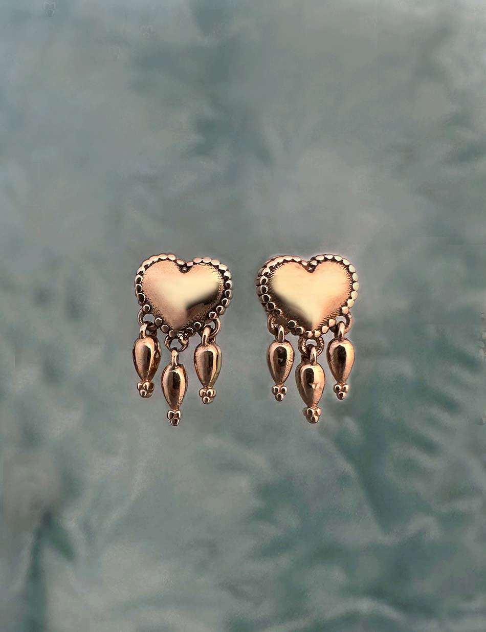 Bleeding heart jewelry 14k gold fringe earring handcrafted in NYC by Honey Drip Jewelry.