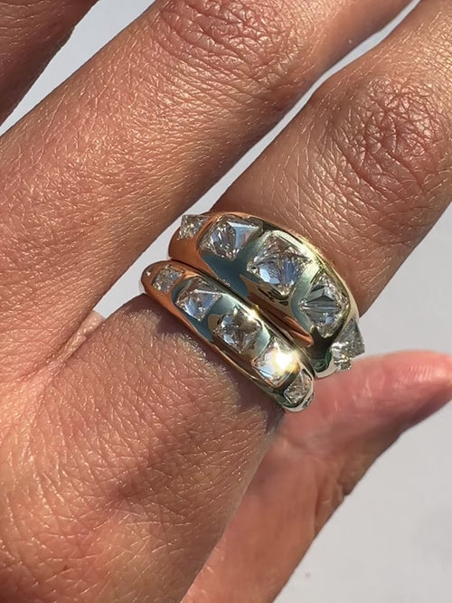 Diamond Spiked gold ring set by honey drip jewelry worn on the finger. Very sparkly inverted white diamonds are an eye catching and elevated choice for those looking for alternative style jewelry.