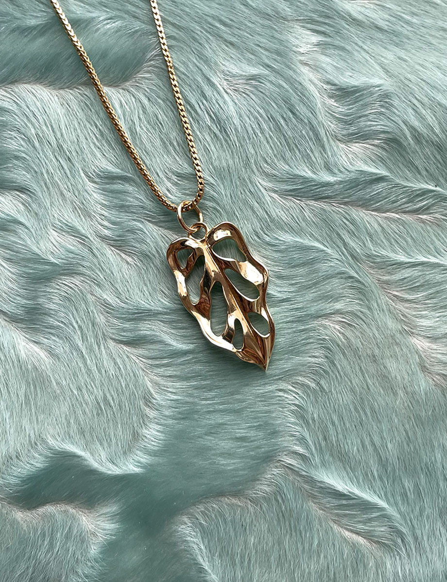 Monstera Obliqua Charm pendant in solid 10k yellow gold by Honey Drip Jewelry NYC