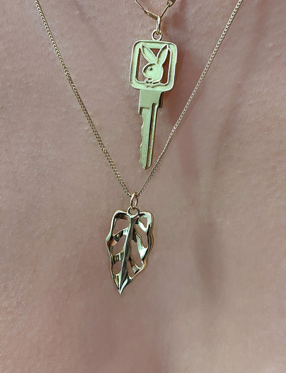 Monstera Obliqua Charm Pendant in solid 10k yellow gold + Playboy Bunny Key Pendant in 10k yellow gold by HONEY DRIP JEWELRY NYC