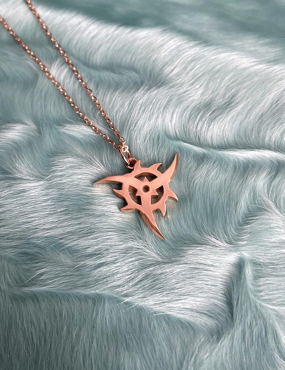 3 Prong Suriken Throwing Star Charm by Honey Drip NYC in 10k rose gold