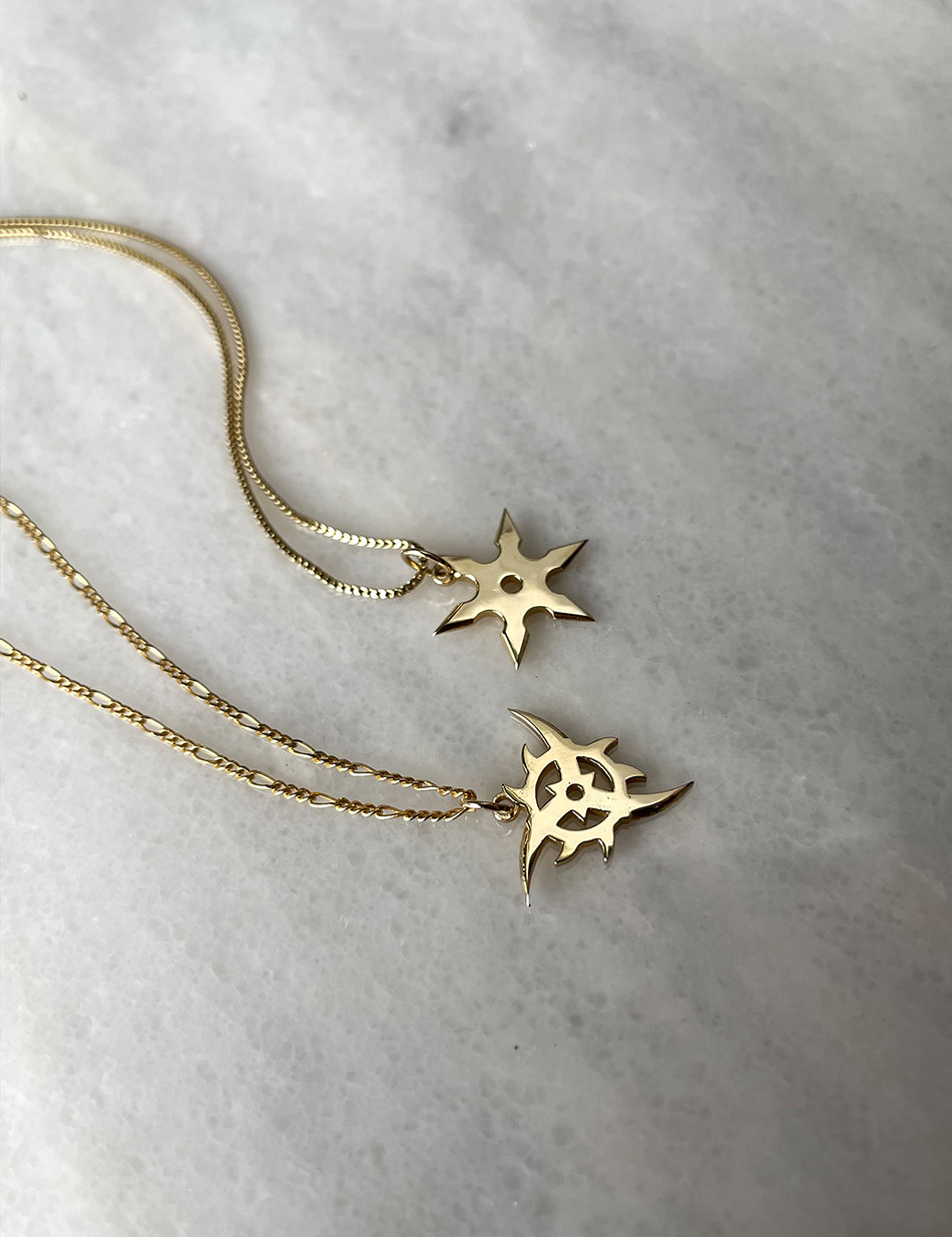 Ninja Star Shuriken charm pendants in 10k yellow gold by HONEY DRIP JEWELRY NYC