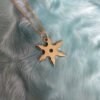 6 Prong Suriken Throwing Star Charm by Honey Drip NYC in 10k gold