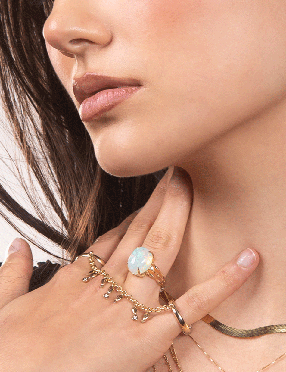 Lucy Ly in Bamboo opal ring in 14k gold with white diamond accents by HONEY DRIP JEWELRY.