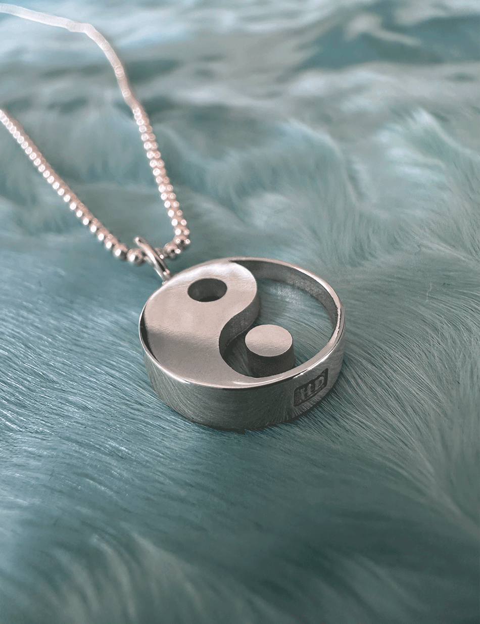 yin yang pendant necklace in sterling silver and quartz by Honey Drip Jewelry.