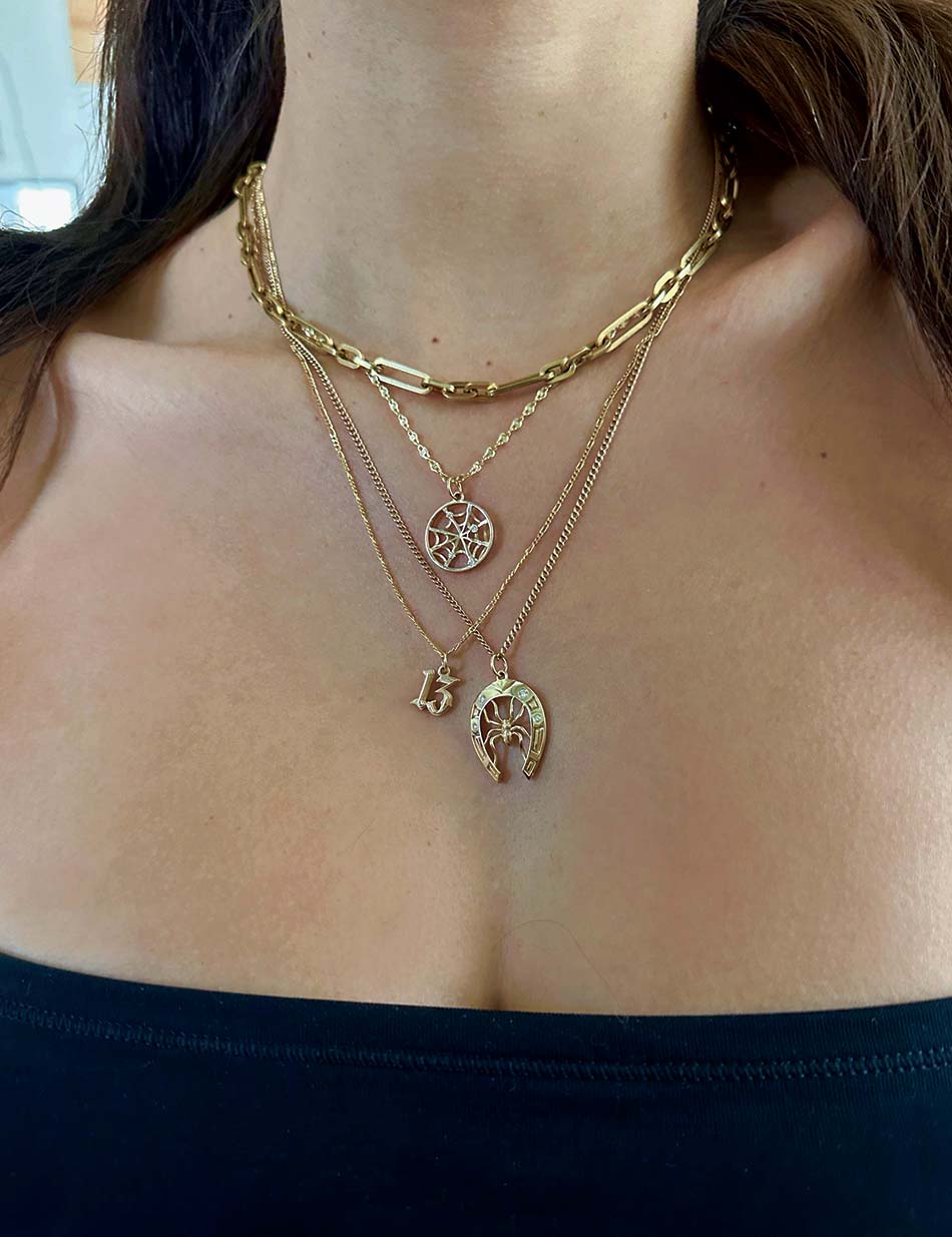 Spider Web Medallion, Horseshoe Spider Charm, and lucky 13 charm Necklace in 14k gold with white diamonds.