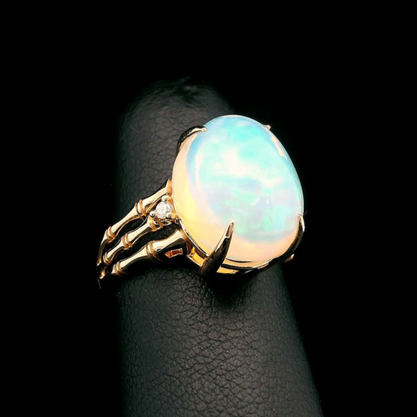 Bamboo opal ring in 14k gold with white diamond accents by HONEY DRIP JEWELRY.